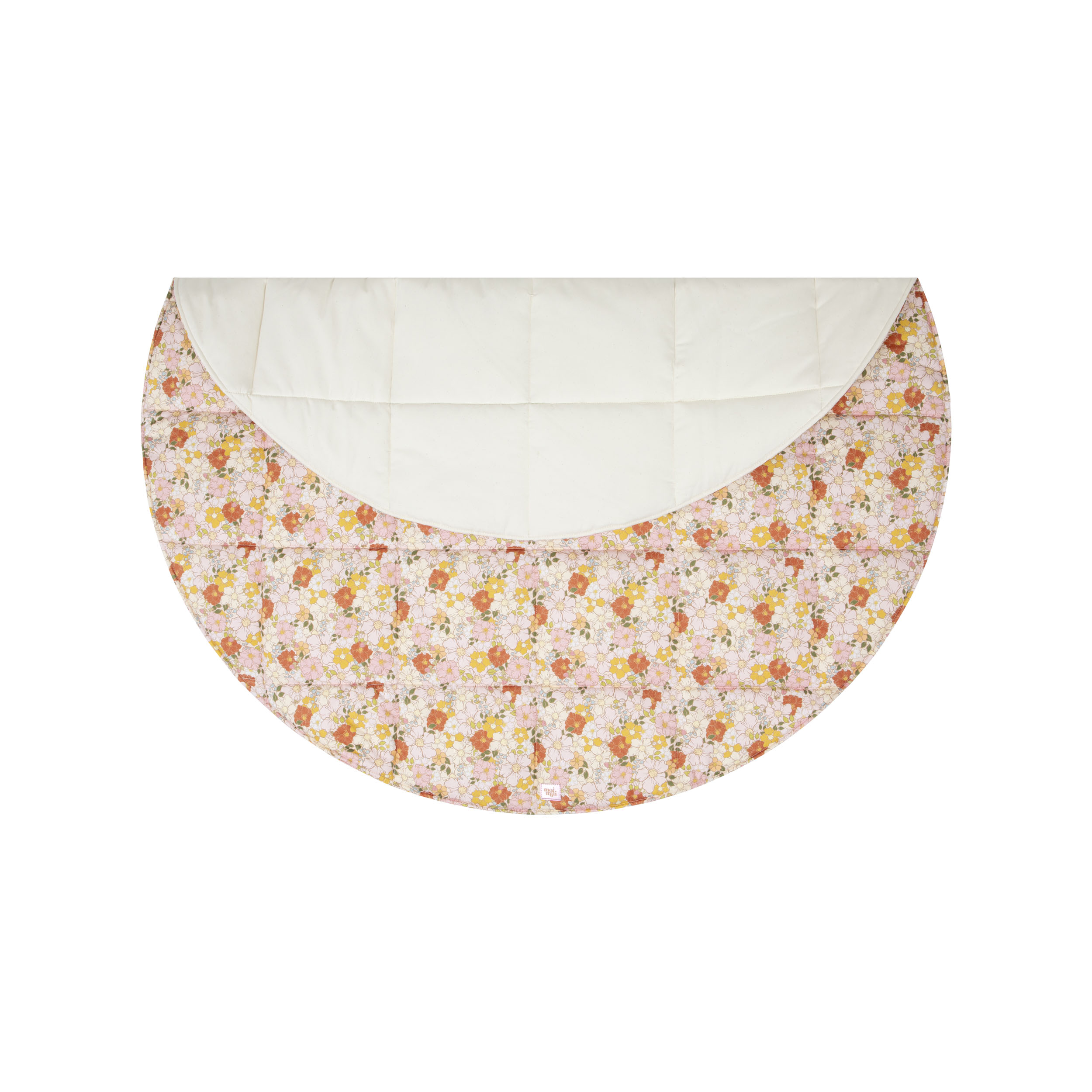 Okrągły, pikowany dywanik dziecięcy z kwiatowym wzorem i kremową odsłoniętą częścią górną